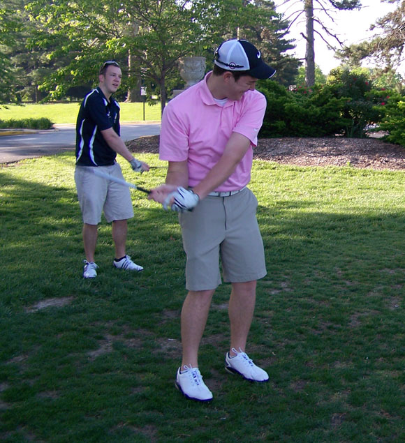 Fellow SLU club golf team members warm up before one of their weekly outings.  Photo courtesy of Chris Elliott 