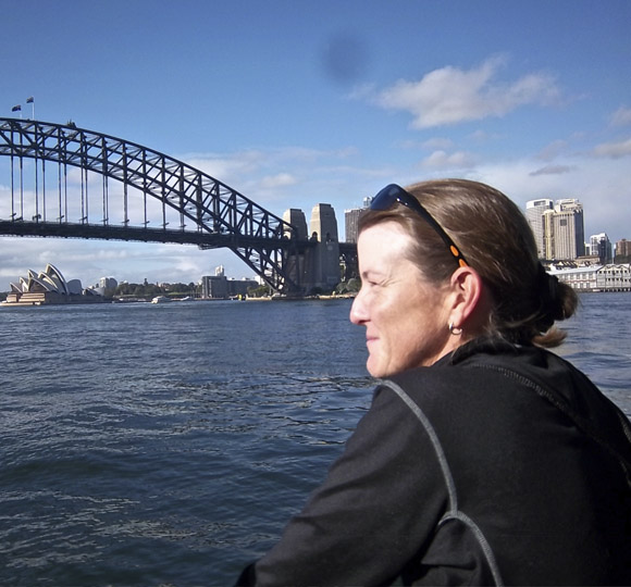 Softball coach Christy Connoyer overlooks the Sydney’s scenic and historic Opera House and Bay Harbour Bridge. Photo Courtesy of Christy Connoyer