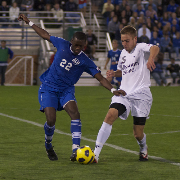 Freshman midfielder Kingsley Bryce attempts to take possession from Missouri State player Gerard Barbero III as the Billikens battled to a 1-1 tie in the homecoming matchup. Shah (Yuqing Xia) / Photo Editor 
