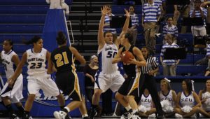 Photo by: Michael Johnson Junior forward Mallory Eggert (50) defends University of Missouri’s Christine Flores in Wednesday, Nov. 16 night’s action at Chaifetz Arena. 