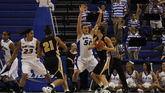 Photo by: Michael Johnson Junior forward Mallory Eggert (50) defends University of Missouri’s Christine Flores in Wednesday, Nov. 16 night’s action at Chaifetz Arena.