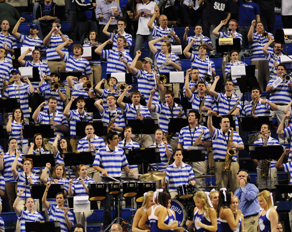 Ryan Giacomino / The University News During Billiken basketball games, elementary school principal Mike Beczkala can be found leading his band members. Beczkala leads the Billiken band during the team’s home games.