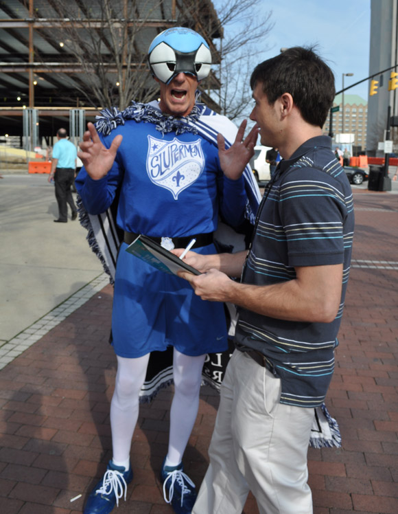 SLUperman, a 1967 John Cook School of Business graduate shows his passion for the Billikens. 