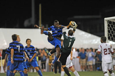 Kingsley Bryce attempts to knock the ball away from the Indiana goal keeper. SLU lost 2-1 on an own goal. 