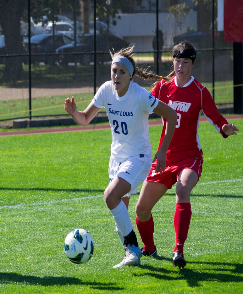 Abbey Stock (20) breaks away from the Dayton defender on Sunday, Oct. 7. The women’s soccer team lost to Dayton 1-0, falling to 1-1-1 in conference play. John Schuler/ Photo Editor