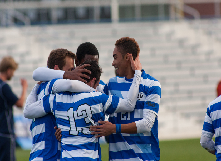onathan Svigos and his teammates celebrating his first goal as a Billiken. The Bills defeated  George Washington 5-0 after suffering a tough loss to Charlotte the previous Friday. John Schuler/Photo Editor
