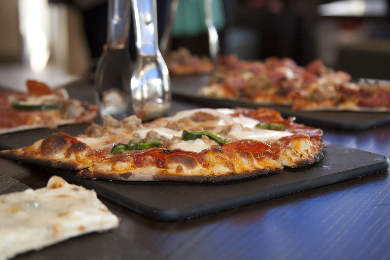 Pizzas+from+a+wood-burning+oven+at+SLU%E2%80%99s+newest+restaurant.+