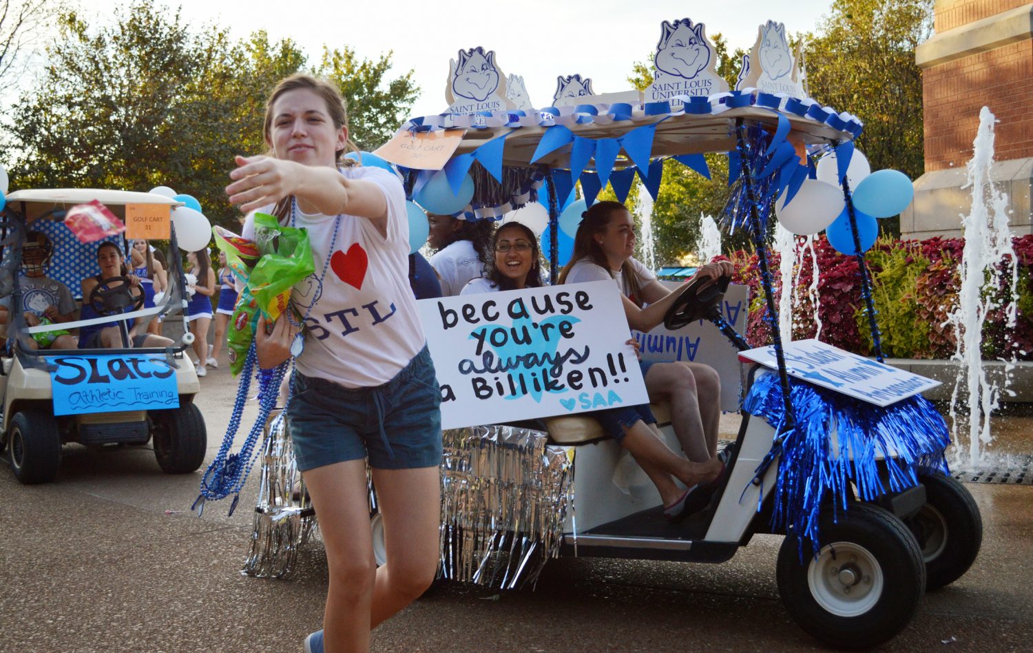 Homecoming: SLU students, alumni, and family participate in the golf-cart parade, one of the many activities held during the weekend.
Elizabeth Scofidio  / Contributor