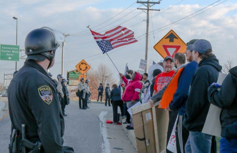 Police officers lined the street, separating pro and anti-Trump parties.