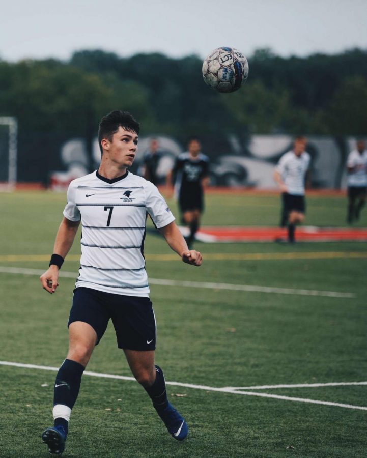 Sophomore, Seosamh Sheerin goes in for a header for Missouri Baptist soccer while playing William Woods. The NAIA has decided to continue with fall sports unlike many of the NCAA sports. (Photo courtesy of Missouri Baptist Athletics)
