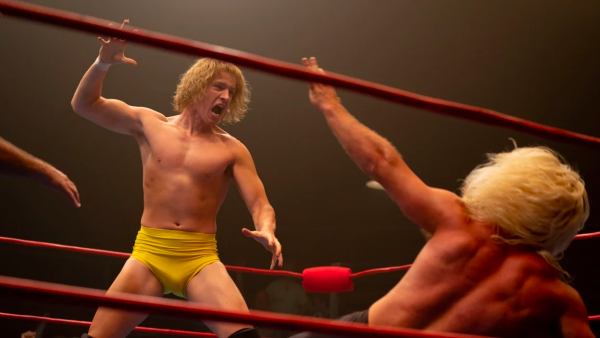 David Von Erich, played by Harris Dickinson, brandishing his family’s iconic move, The Iron Claw, at the end of a match. (Photo courtesy of A24)