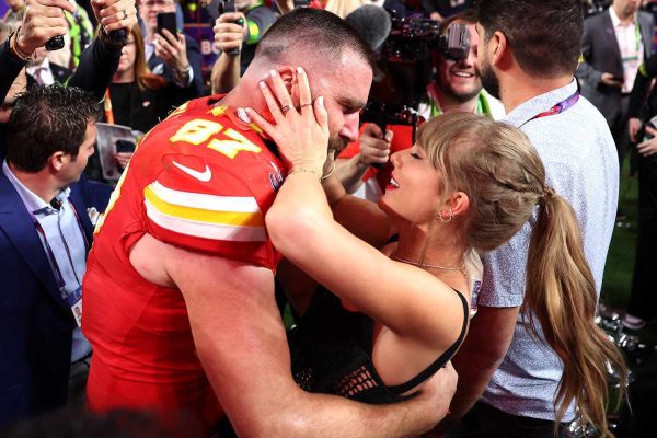 Taylor Swift and Travis Kelce celebrate Kelces Super Bowl win after the ending of the game (Ezra Shaw/Getty Images).