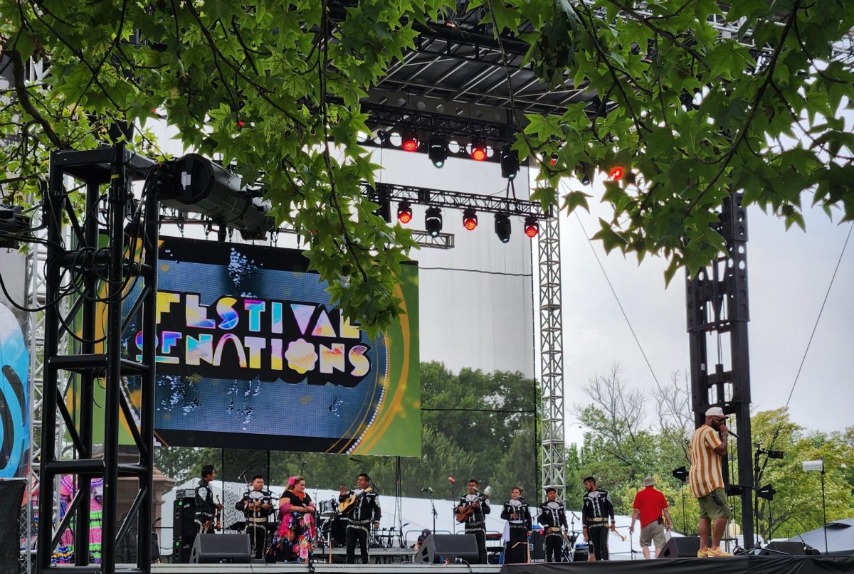 One of the two international performance stages at the Festival features local and international artists performing for large crowds.