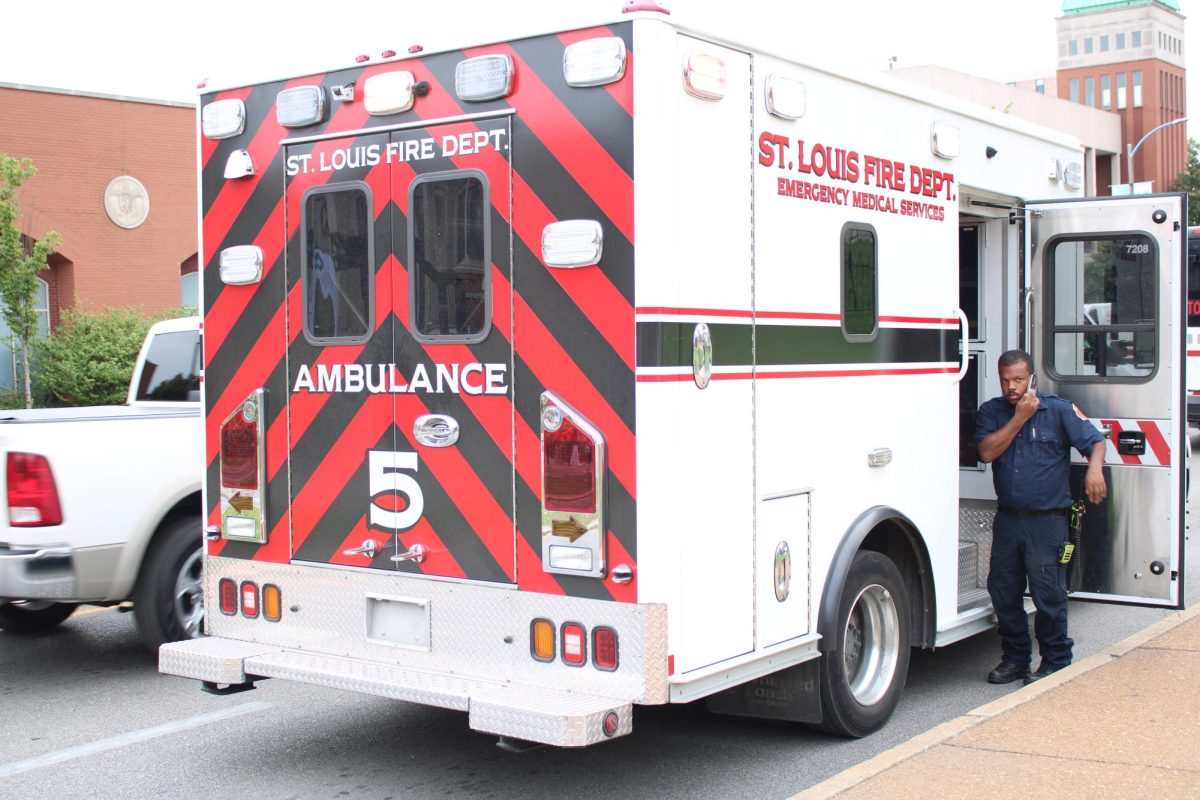 Ambulance parked alongside Grand crosswalk at Saint Louis University on Sep. 12, 2024.