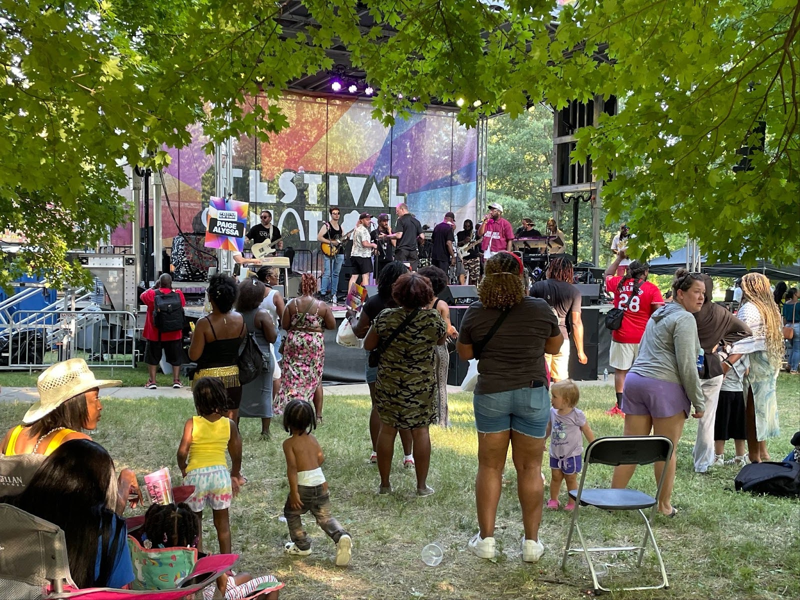 A performer engages with the audience at the Festival of Nations, encouraging cooperation and positivity in Tower Grove Park on Aug. 24, 2024. 