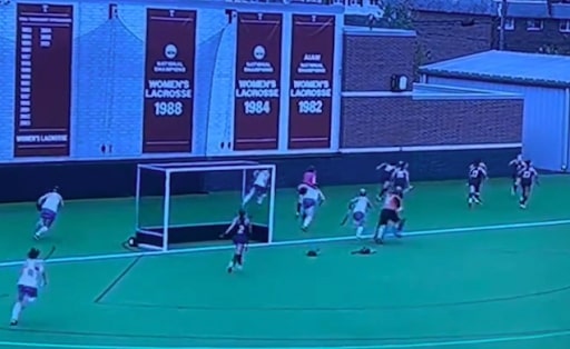 Saint Louis and La Salle University field hockey players run for cover following eruption of gunfire in vicinity of Temple University pitch on Sept. 27, 2024. 
(Photo courtesy of ESPN)