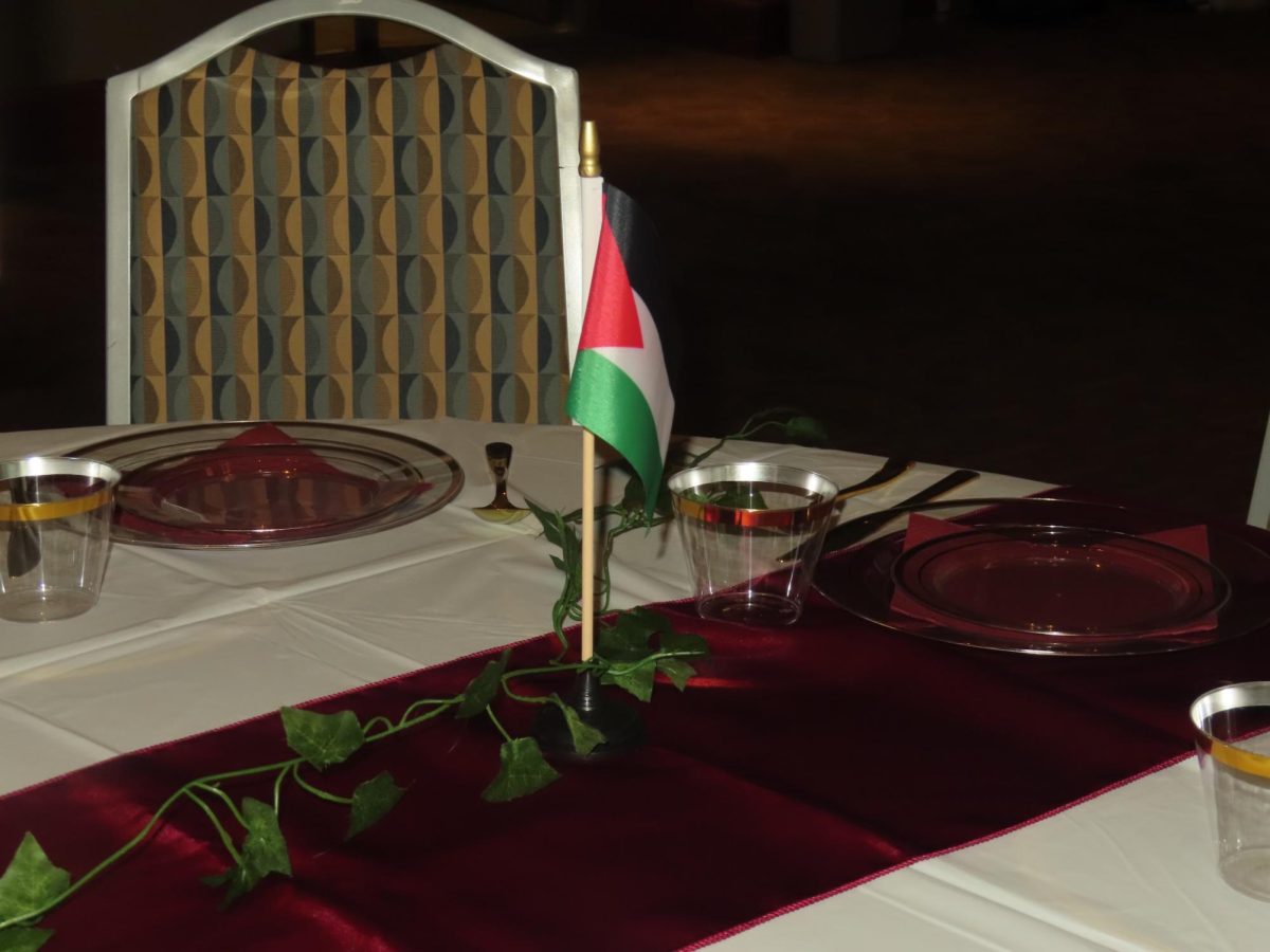 Palestinian flags act as centerpieces for the tables attendees sit at during fall dinner in the Wool Ballroom in the Busch Student Center, Oct. 12, 2024.