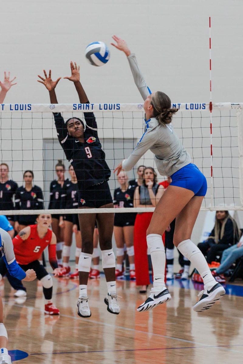 Delaney Rice spikes the ball against Illinois State.