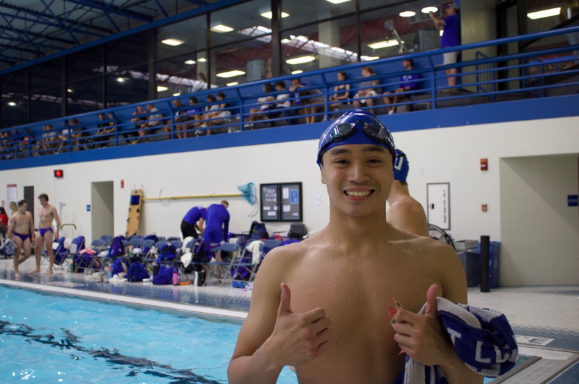 Brae Sanchez, captain of the SLU swim team, flashes two thumbs up ahead of his race at the Simon Recreation Center on Friday Oct. 4, 2024. 
