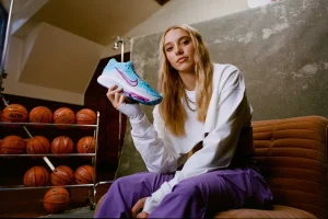 Paige Bueckers posing with her shoe, the G.T. Hustle 3’s. Photo Courtesy of Nike.
