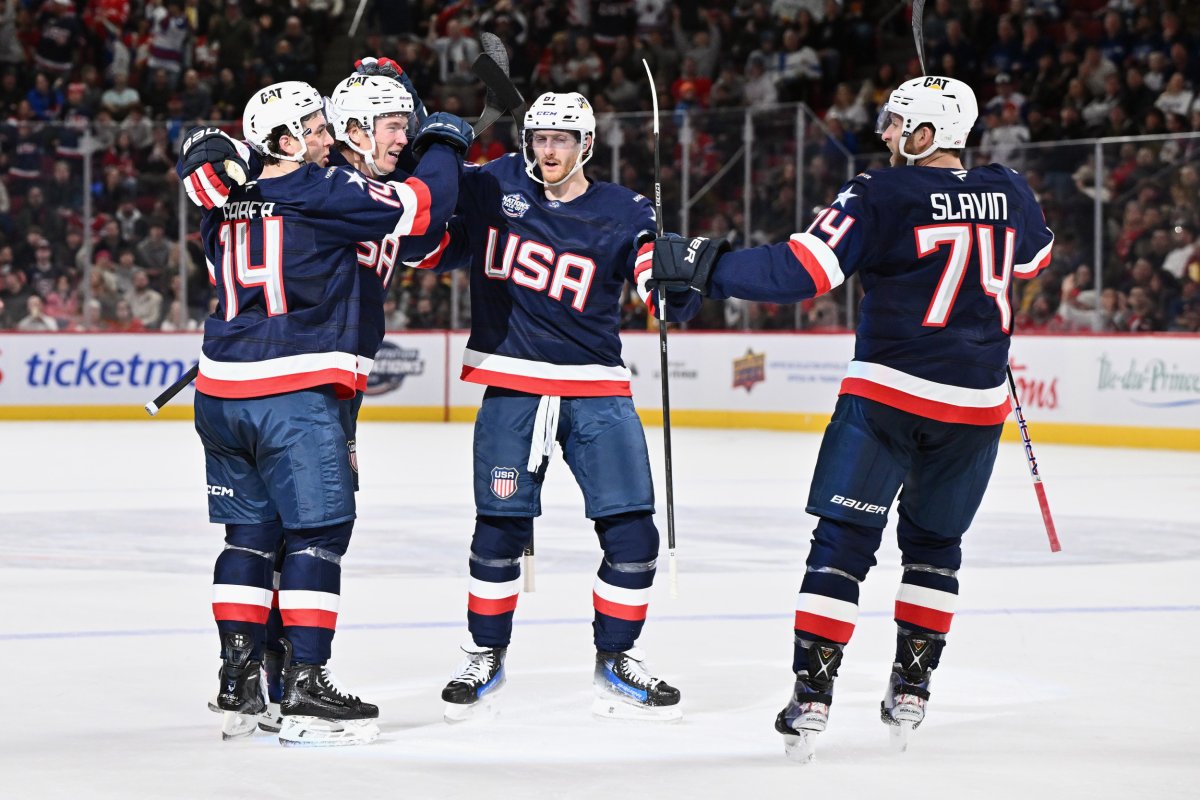 USA forward Matt Boldy (#12) celebrates with teammates after scoring against Team Finland during the second period of the NHL 4 Nations Face-Off at Bell Centre on Feb. 13, 2025, in Montreal, Quebec, Canada. Photo by Minas Panagiotakis/ Getty Images. 