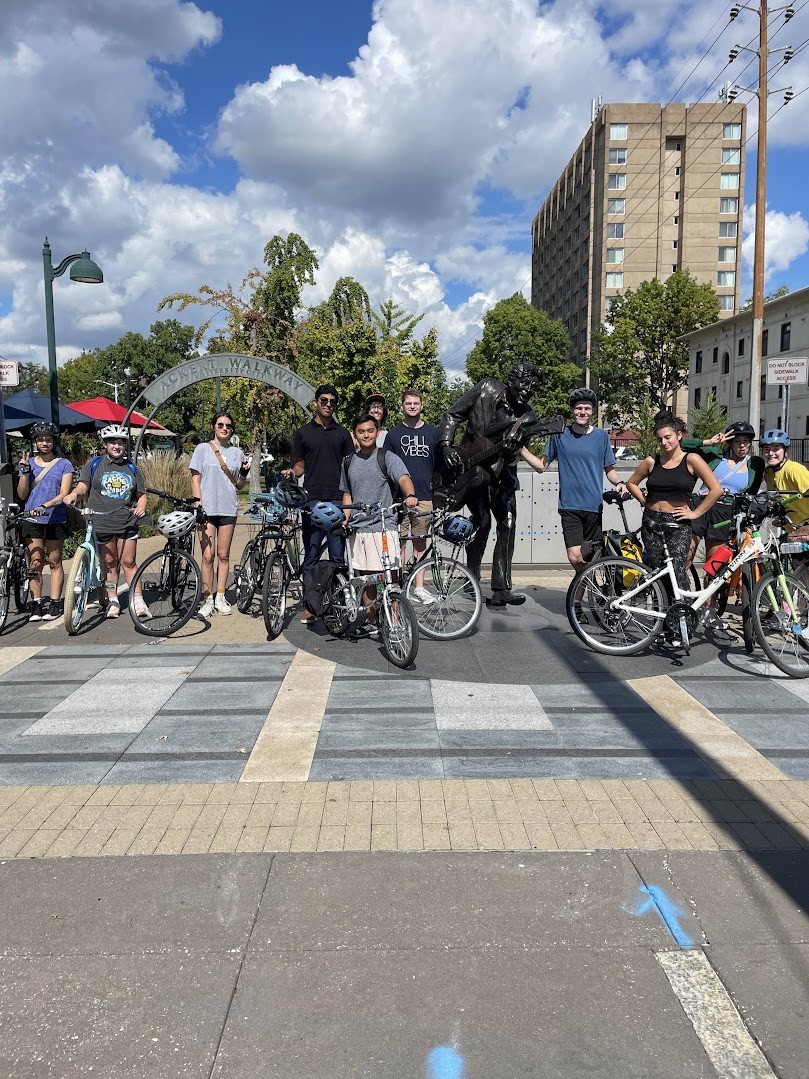 SLU On the Move members pose at the Delmar Loop during a bike ride Sept. 25, 2025. (SLU On the Move)