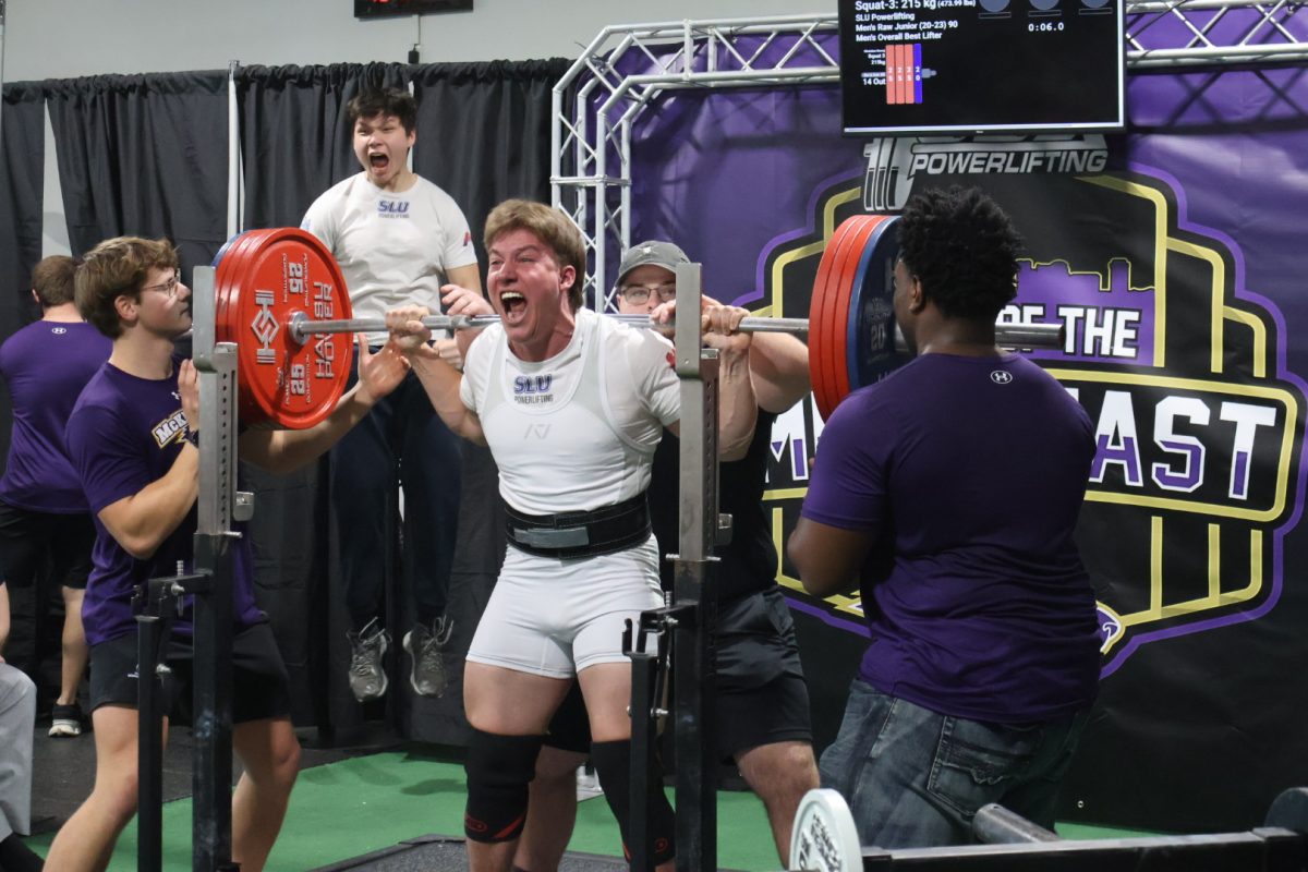 Chrisitan Nowoj sets a new squat PR of 215 kilograms, or 474 pounds, at the "Beast of the Metro East" meet at McKendree University on Feb. 7. 