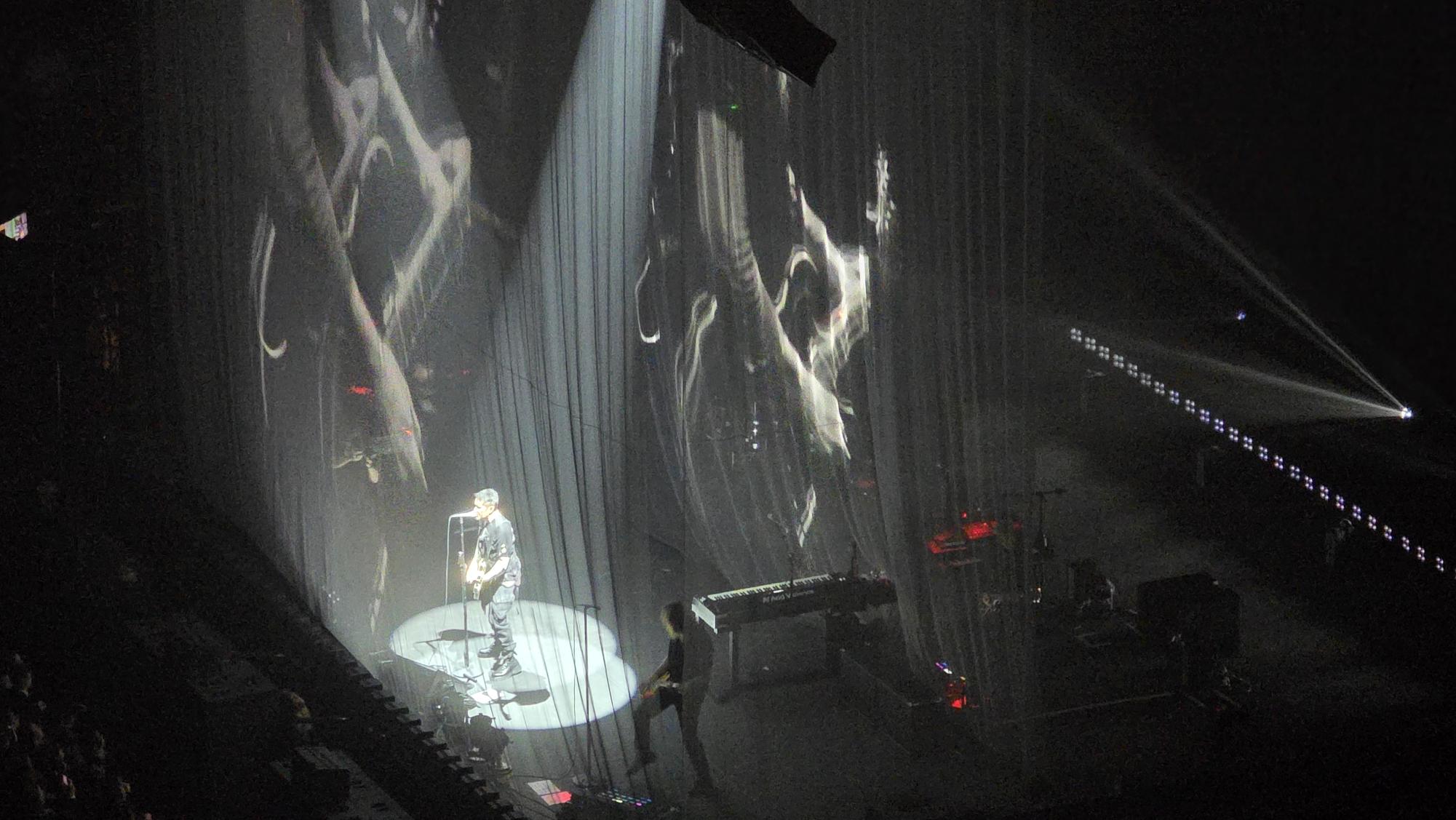 Trent Reznor of Nine Inch Nails sings on stage at the Enterprise Center.