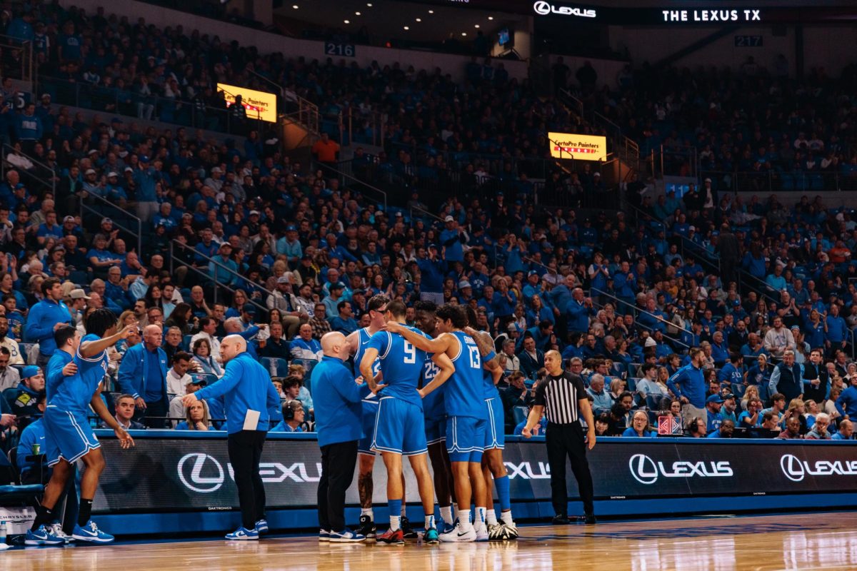 The SLU men's basketball team huddling up during a timeout in a game against VCU on Feb. 20, 2026.
