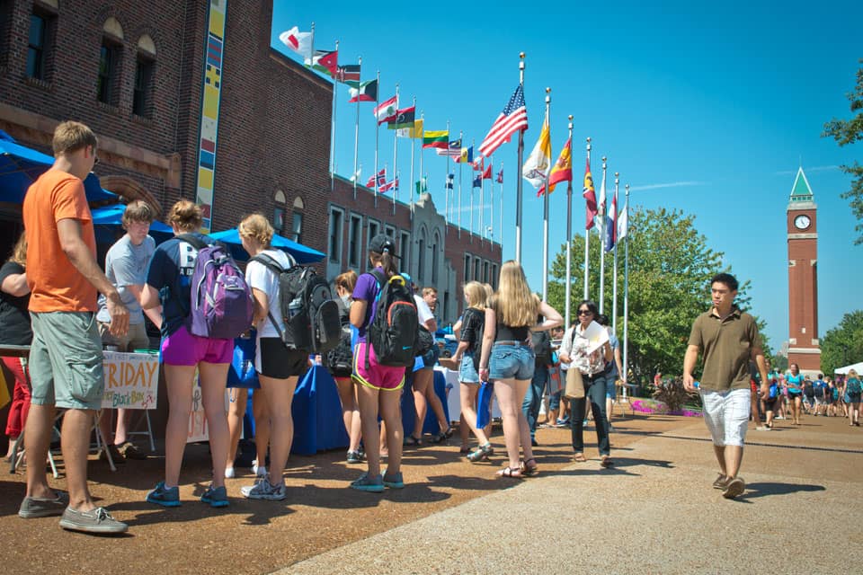 Saint Louis University students attend SLU fair, showcasing active clubs and student organizations.