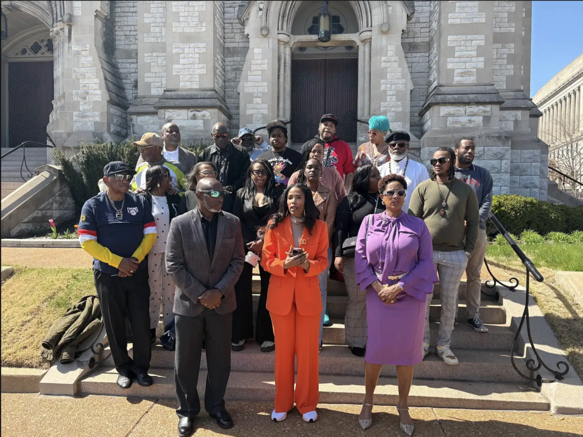 Areva Martin, who serves as legal counsel for the Descendants of the St. Louis University Enslaved, speaks at a press conference in front of St. Francis Xavier College Church on March 26, 2025, where a prayer service and public apology for SLU’s role in slavery was set to take place. (Noa Vacek)
